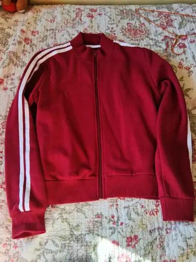 Chaqueta deportiva roja con cierre y rayas - miniatura 1
