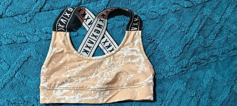 Top deportivo NGX beige con tirantes cruzados - 2