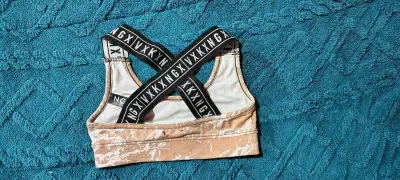 Top deportivo NGX beige con tirantes cruzados - miniatura 4