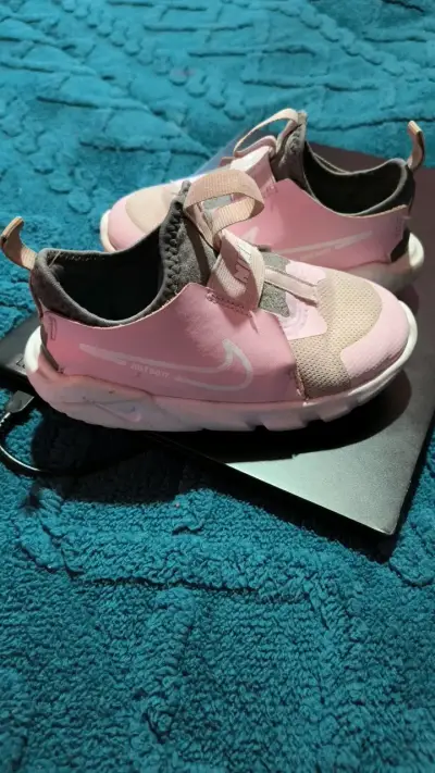 Zapatillas deportivas rosadas para niños Nike - miniatura 1