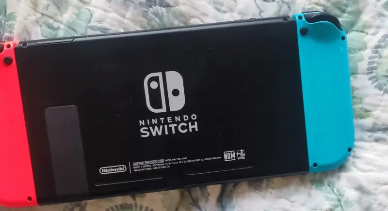 Nintendo switch 1 + 128 gb + dos juegos - 6