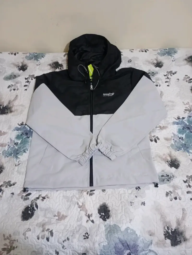 Chaqueta cortaviento System Drift bicolor