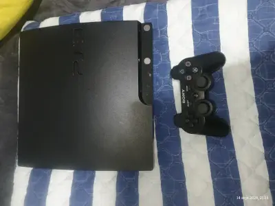 Consola PlayStation 3 Slim con control y juegos - miniatura 1