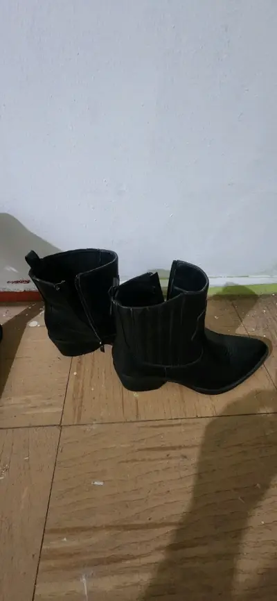 Botines negros de cuero para mujer - miniatura 1