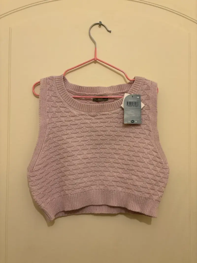 Chaleco sin mangas rosa tejido para mujer