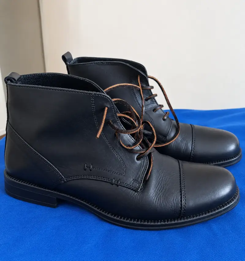 Botines de cuero negro para hombre