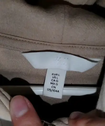Polerón beige con capucha y cierre H&M talla L - miniatura 3