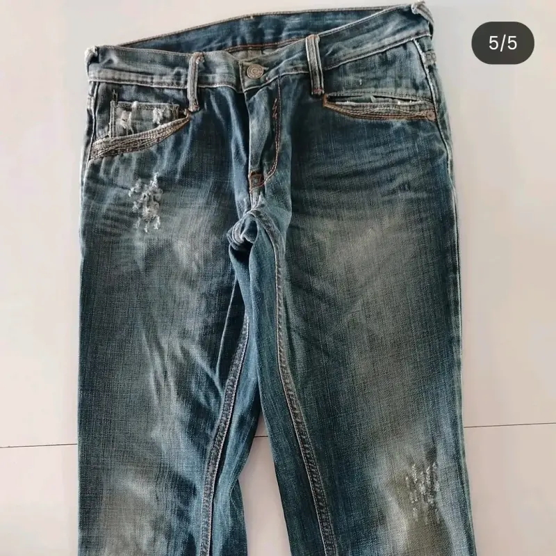 Jeans estilo  desgastado - 4