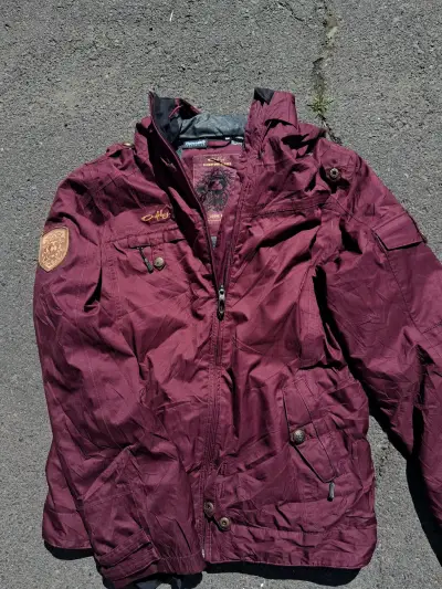 Chaqueta burdeo Oakley - miniatura 1