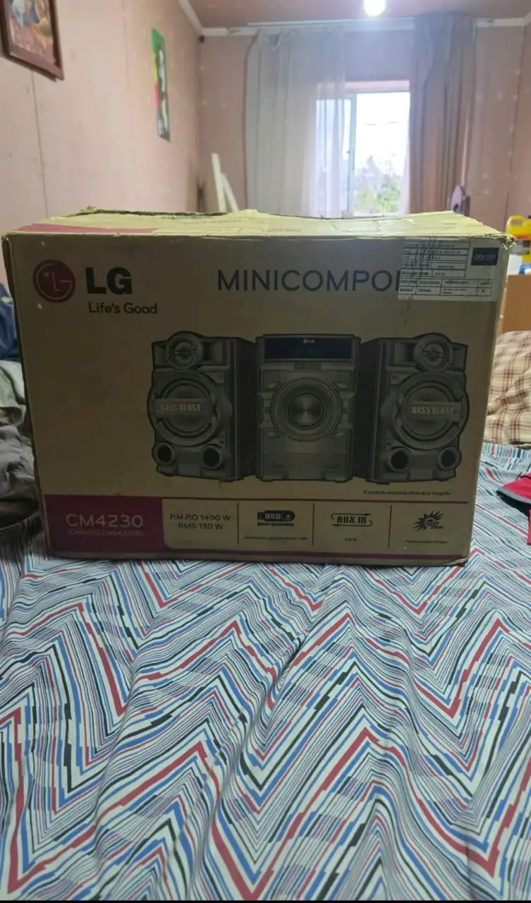 Minicomponente LG CM4230 con Bass Blast - 1