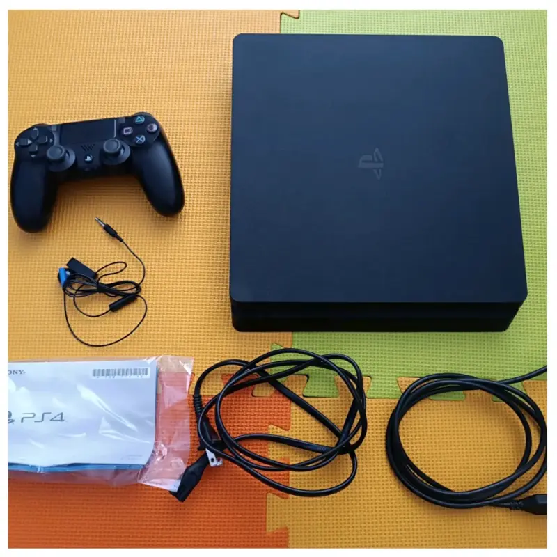 Consola PS4 Slim 1TB con accesorios seminueva - 2