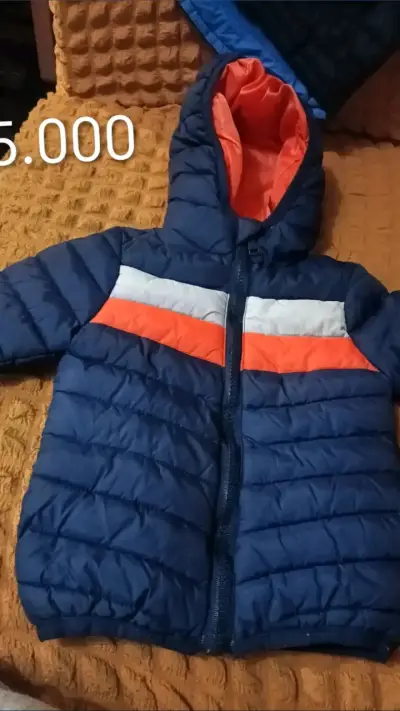 Chaqueta acolchada azul para niño con capucha - miniatura 1