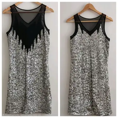 Vestido de lentejuelas plateado con malla negra - miniatura 1