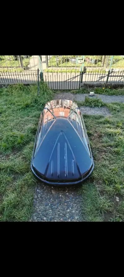 Baúl portaequipaje de techo negro para auto - miniatura 1