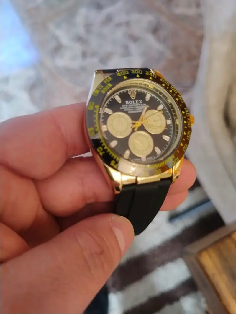 Reloj Rolex Daytona de Oro y Negro - 1