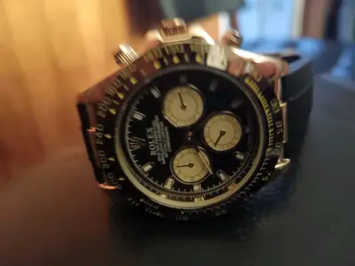 Reloj Rolex Daytona de Oro y Negro - miniatura 2