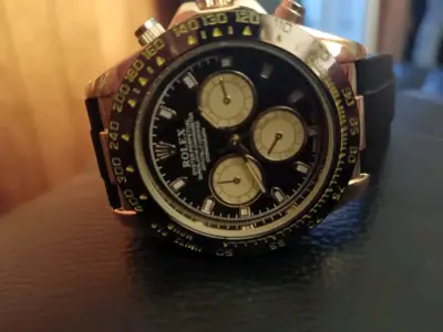 Reloj Rolex Daytona de Oro y Negro - miniatura 3