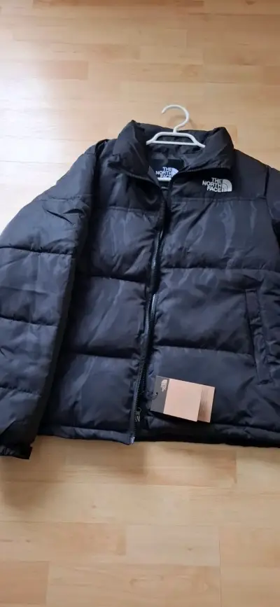 Chaqueta negra The North Face acolchada - miniatura 1