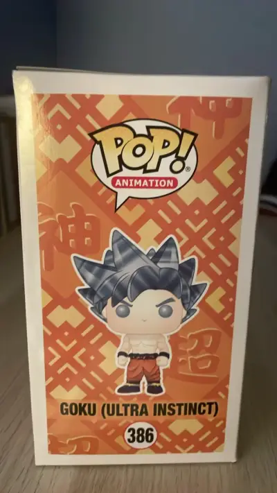 Figura Funko Pop Goku Ultra Instinct - miniatura 4