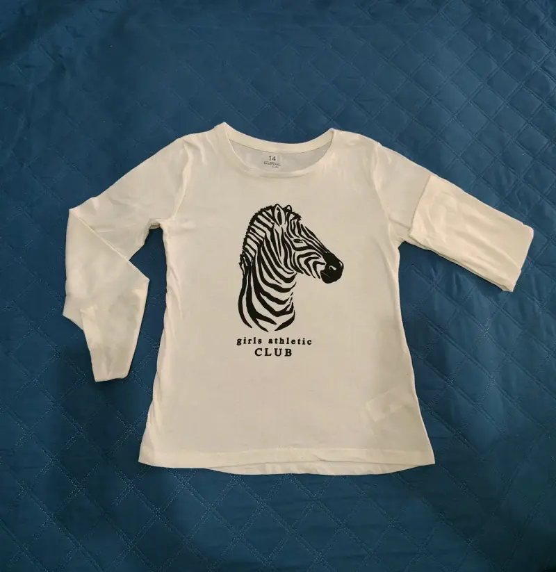 Polera blanca para niña con diseño de cebra - 3