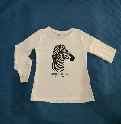 Polera blanca para niña con diseño de cebra - miniatura 3