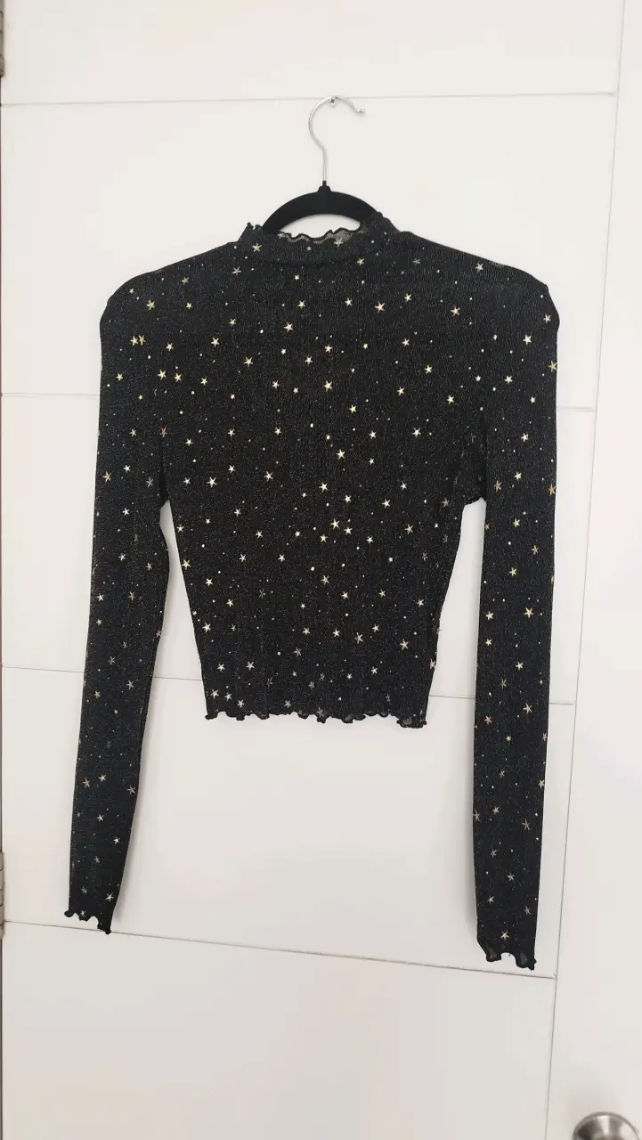 Blusa de malla negra con estrellas - 4
