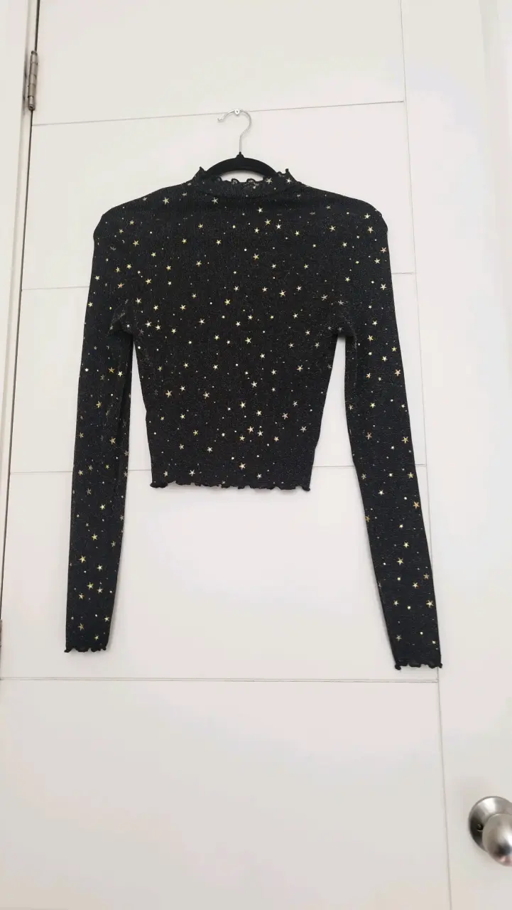 Blusa de malla negra con estrellas - 6