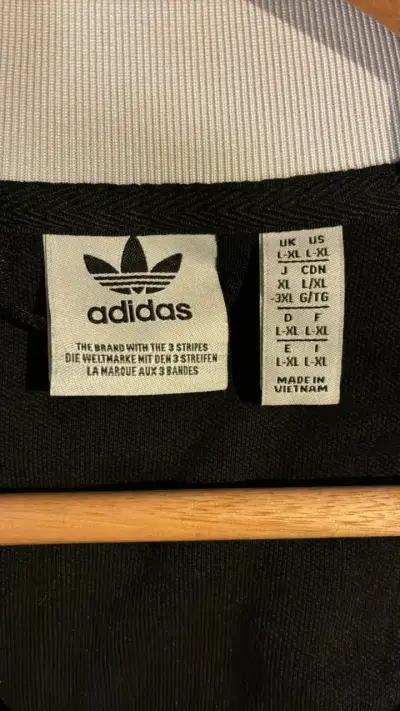 Chaqueta deportiva Adidas negra con logo - miniatura 3