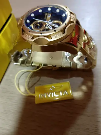 Reloj Invicta Marvel dorado con caja original - miniatura 2