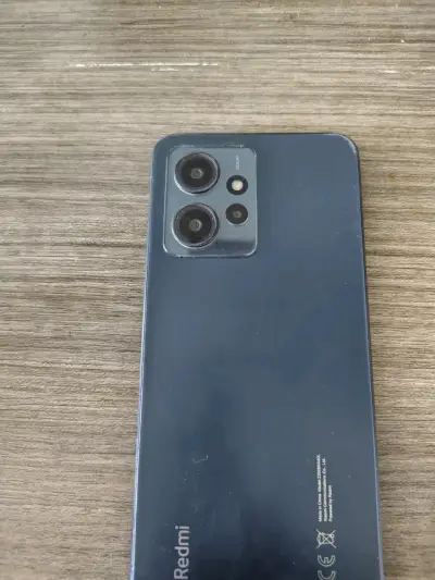 Smartphone Xiaomi Redmi note 12i con pantalla rota - miniatura 3