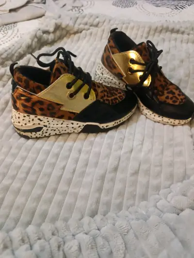Zapatillas deportivas con estampado animal print - miniatura 1