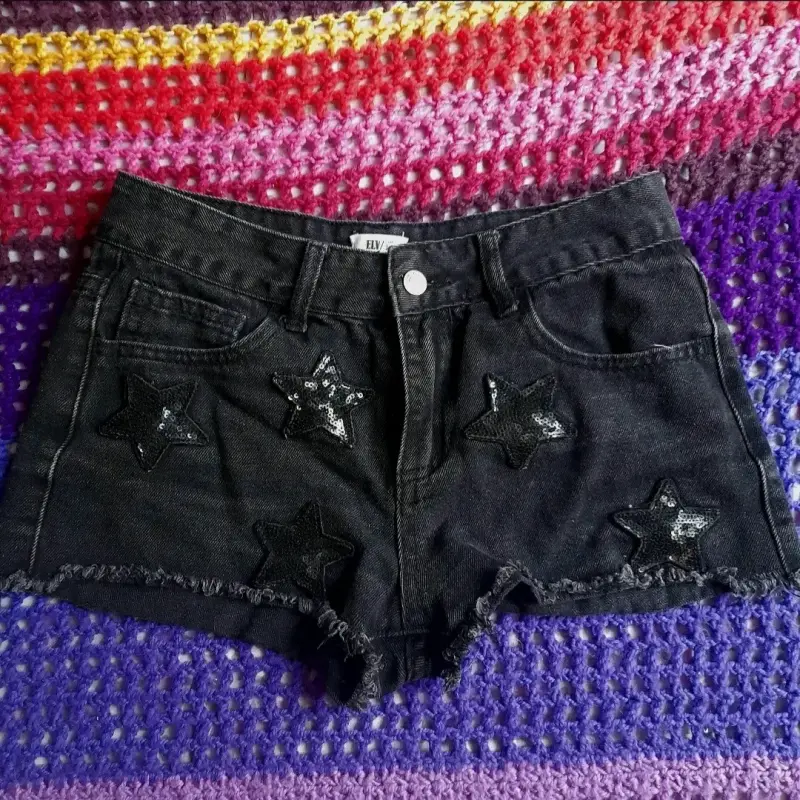 Shorts de mezclilla negros con estrellas talla 14