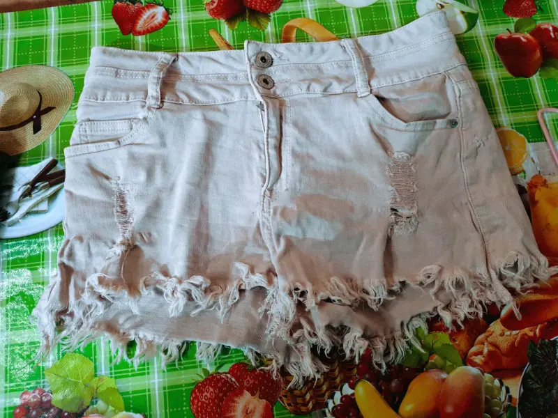 Shorts de mezclilla palo de rosa con flecos - 2
