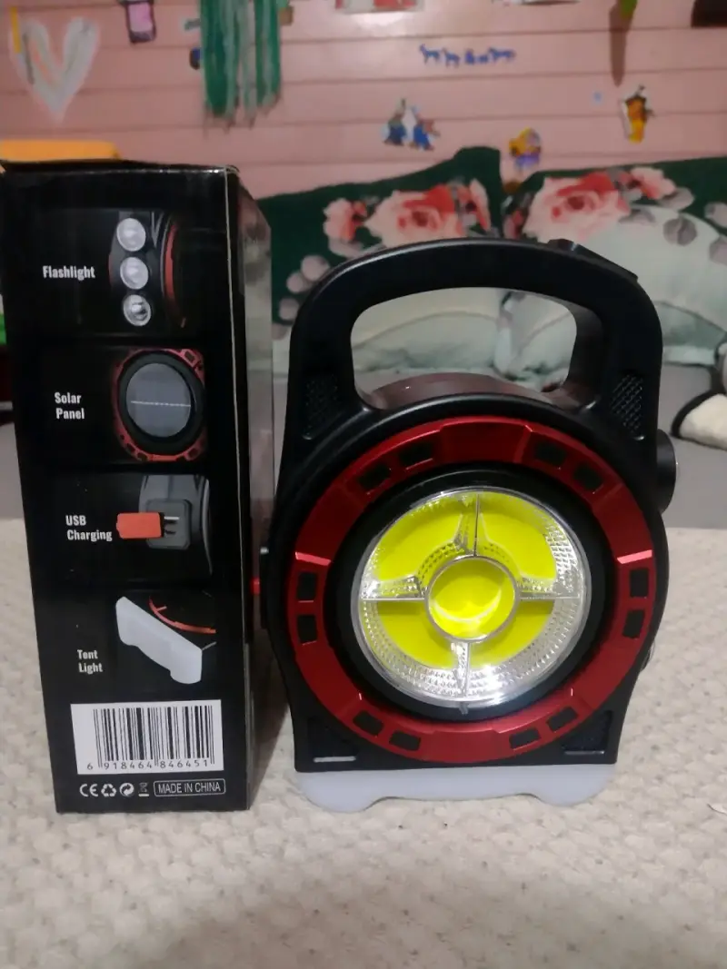 Lámpara solar portátil para camping con panel USB