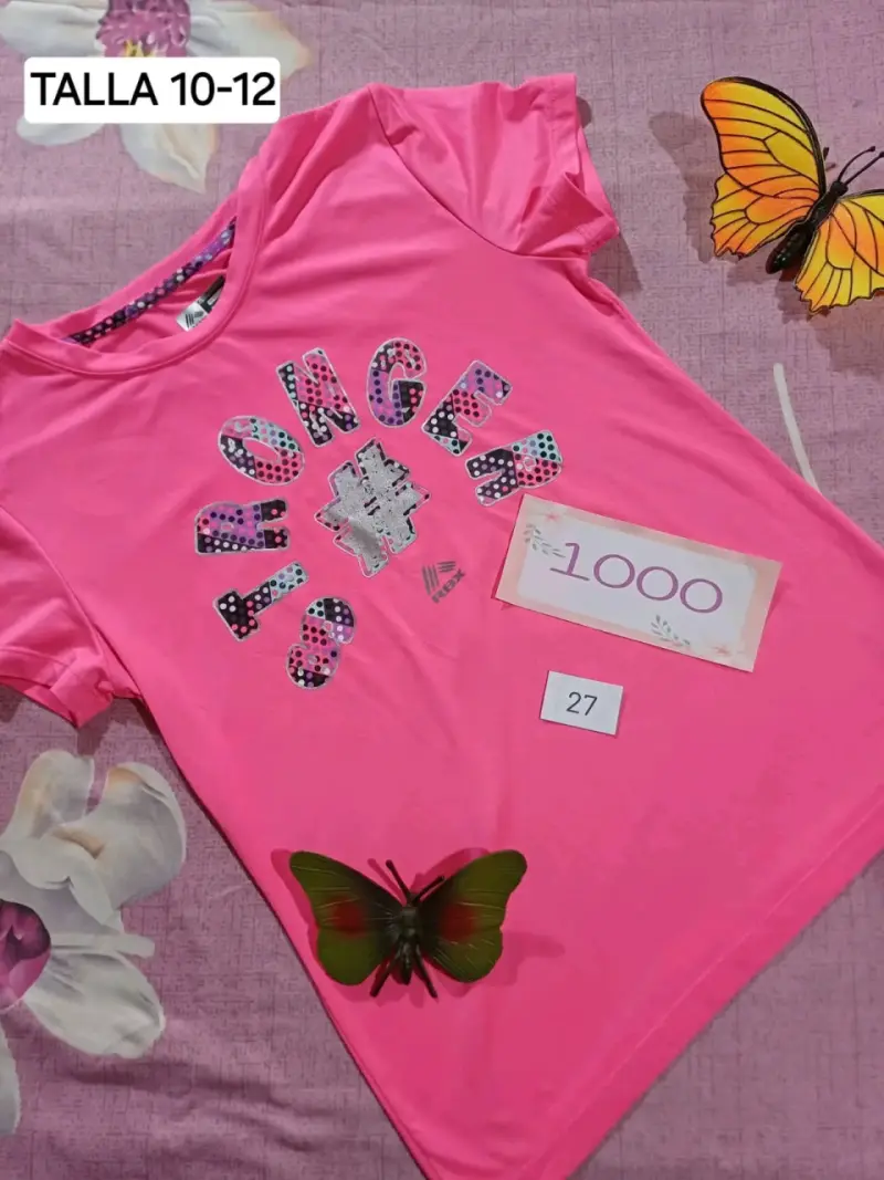Polera rosa para niña con diseño 'Stronger'