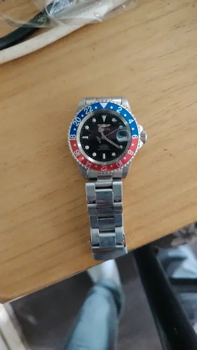 Reloj Invicta automático bisel azul y rojo - miniatura 1
