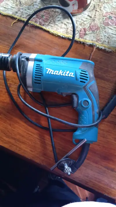 Taladro Percutor Makita HP1630 710W - miniatura 3