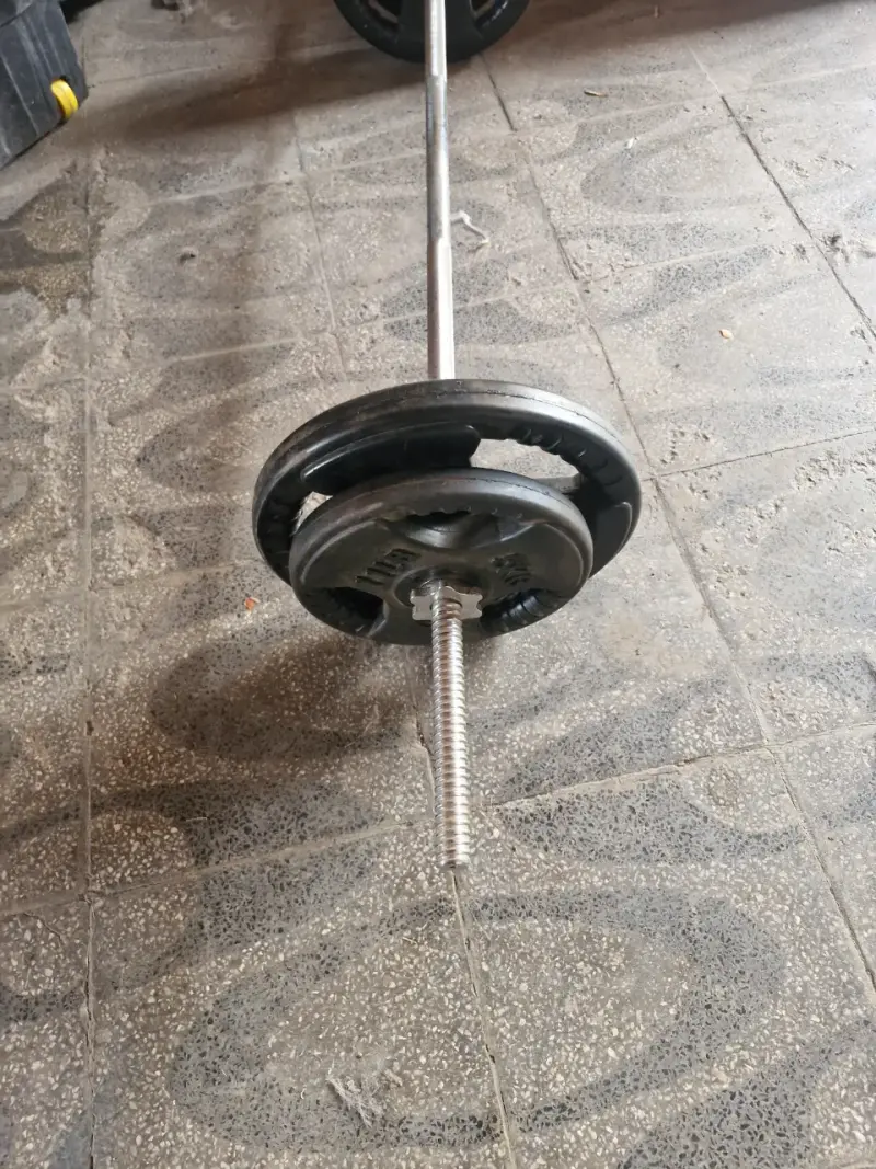 Barra de pesas con discos ajustables - 2