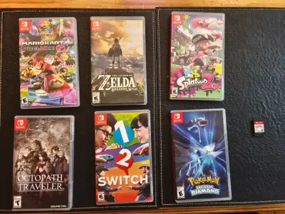 Nintendo Switch con Joy-Con y juegos adicionales - miniatura 2