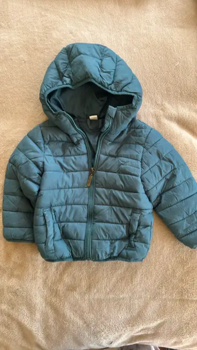 Chaqueta acolchada azul para niño con capucha - miniatura 1