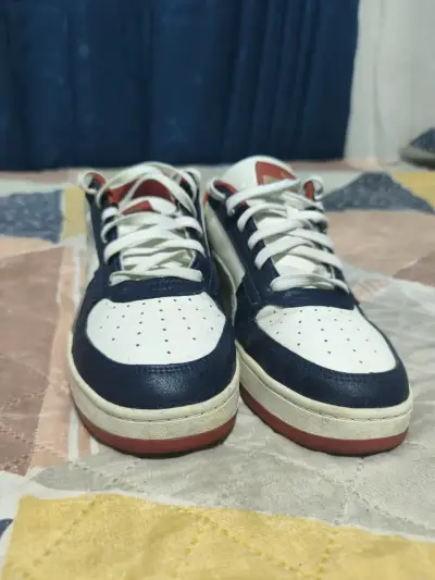 Zapatillas deportivas Puma blancas y azules - miniatura 1