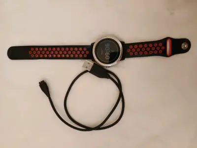 Reloj inteligente Garmin con correa deportiva - miniatura 1