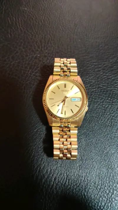 Reloj Seiko automático dorado - miniatura 1