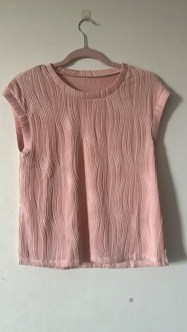Blusa sin mangas texturada rosa