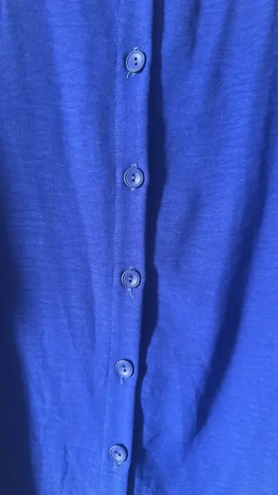 Vestido azul con volantes y botones - miniatura 3