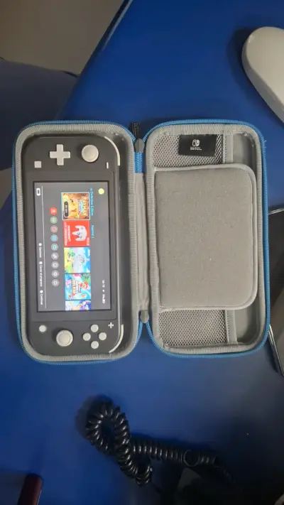Consola Nintendo Switch Lite con juegos incluidos - miniatura 3