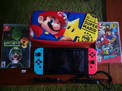 Nintendo Switch con juegos y estuche Super Mario - miniatura 1