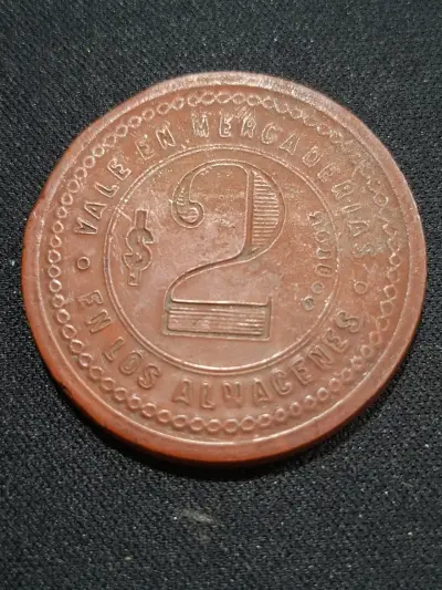 Ficha de 2 pesos antigua de almacén - miniatura 1