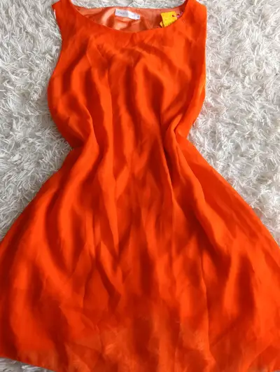 Vestido naranja sin mangas con lazo trasero - miniatura 1