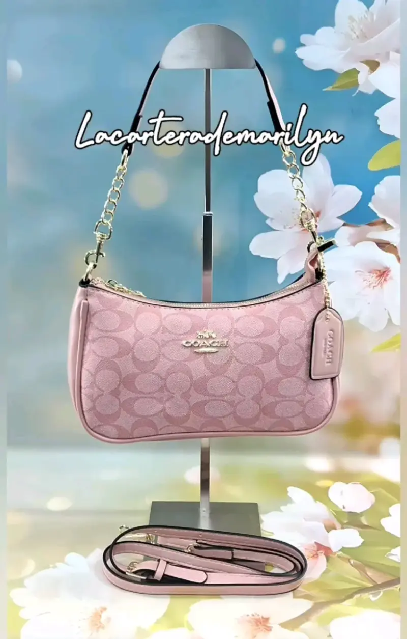 Cartera Coach rosa con correa ajustable - 1